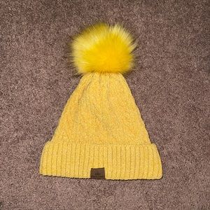 yellow fuzzy winter hat